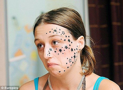 sad-face-tattoo-girl