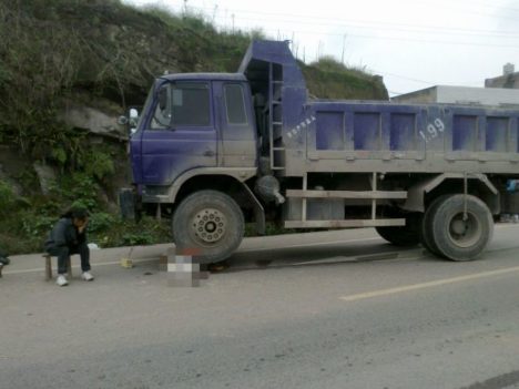Five-year-old boy run over by same lorry driver several times, Luzhou, Sichuan Province, China - 20 Oct 2011